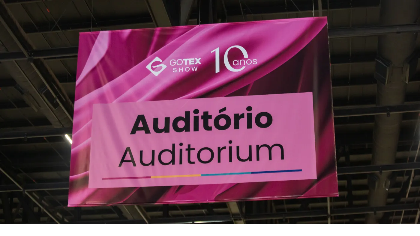 Banner indicando o auditório na Gotex Show 2024